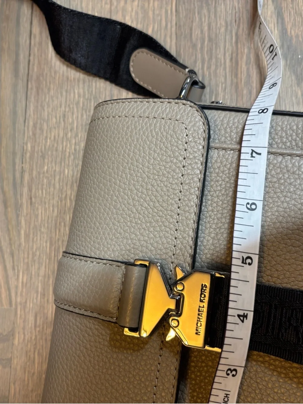 Michael Kors Beige Leather Messenger with Black Strap. NWOT
